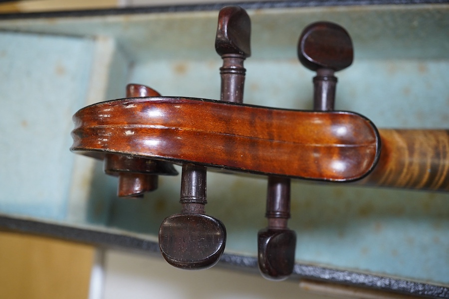 A late 19th century French Chipot-Vuillaume violin, with Edward Withers case, back measures 36cm.